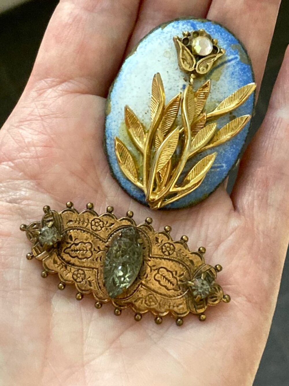 Pair of unique copper & stone brooches